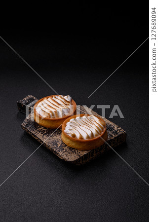 Lemon tart, meringue pie or fruit cream tart 127689094
