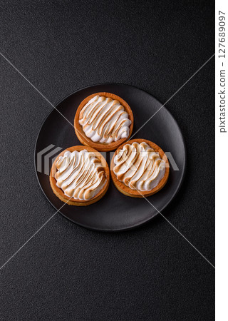 Lemon tart, meringue pie or fruit cream tart Lemon tart, meringue pie or fruit cream tart 127689097