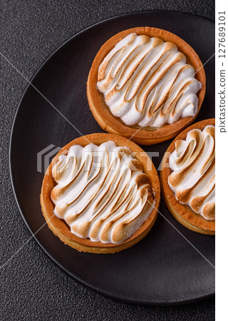 Lemon tart, meringue pie or fruit cream tart 127689101