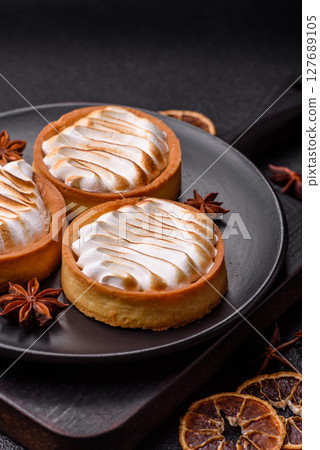 Lemon tart, meringue pie or fruit cream tart Lemon tart, meringue pie or fruit cream tart 127689105