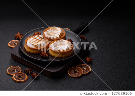 Lemon tart, meringue pie or fruit cream tart Lemon tart, meringue pie or fruit cream tart 127689106