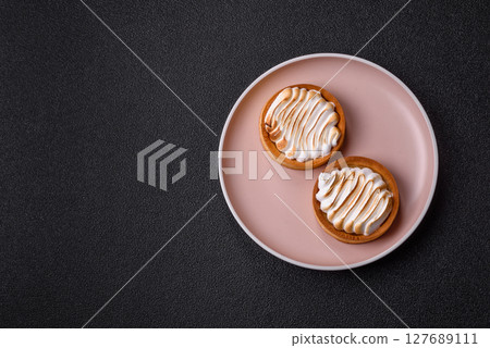 Lemon tart, meringue pie or fruit cream tart Lemon tart, meringue pie or fruit cream tart 127689111