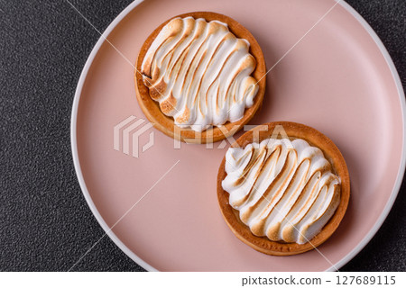 Lemon tart, meringue pie or fruit cream tart Lemon tart, meringue pie or fruit cream tart 127689115