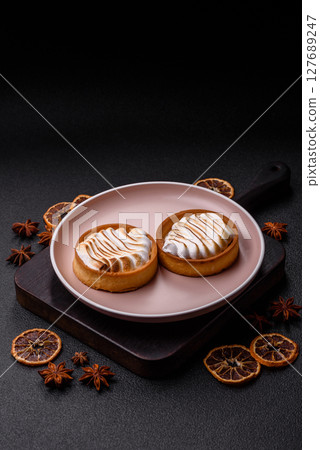 Lemon tart, meringue pie or fruit cream tart 127689247