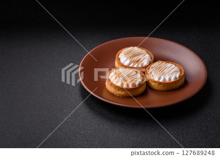 Lemon tart, meringue pie or fruit cream tart Lemon tart, meringue pie or fruit cream tart 127689248