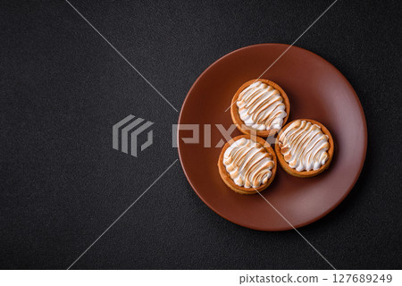 Lemon tart, meringue pie or fruit cream tart Lemon tart, meringue pie or fruit cream tart 127689249