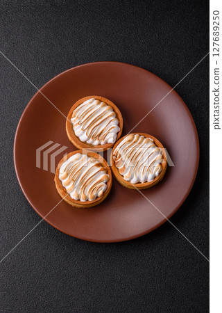 Lemon tart, meringue pie or fruit cream tart Lemon tart, meringue pie or fruit cream tart 127689250
