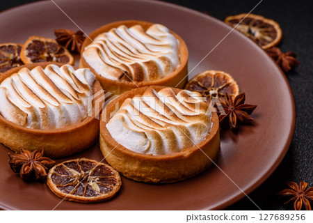 Lemon tart, meringue pie or fruit cream tart Lemon tart, meringue pie or fruit cream tart 127689256