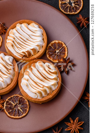 Lemon tart, meringue pie or fruit cream tart 127689258