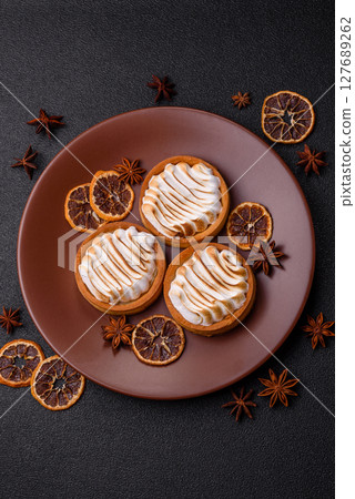 Lemon tart, meringue pie or fruit cream tart Lemon tart, meringue pie or fruit cream tart 127689262