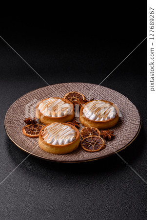 Lemon tart, meringue pie or fruit cream tart Lemon tart, meringue pie or fruit cream tart 127689267