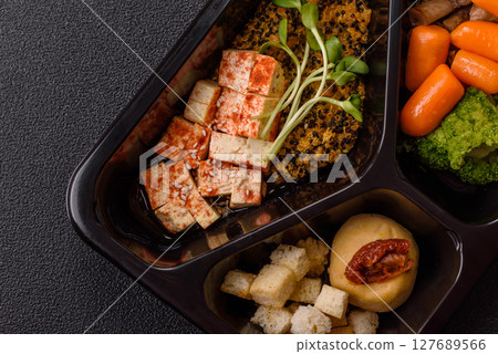 Food bowl with tofu, quinoa, broccoli and carrots, microgreens Food bowl with tofu, quinoa, broccoli and carrots, microgreens 127689566