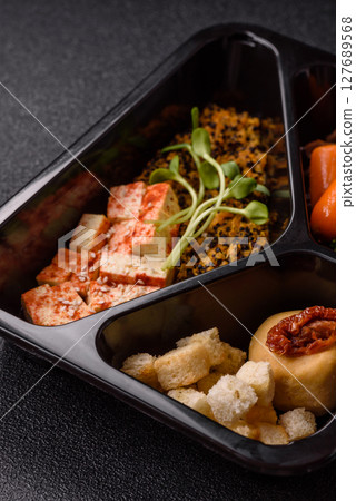 Food bowl with tofu, quinoa, broccoli and carrots, microgreens Food bowl with tofu, quinoa, broccoli and carrots, microgreens 127689568