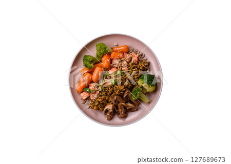 Food bowl with tofu, quinoa, broccoli and carrots, microgreens 127689673
