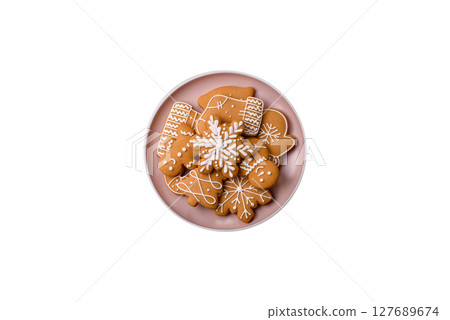 Christmas winter gingerbread, holiday biscuits on monochrome background 127689674