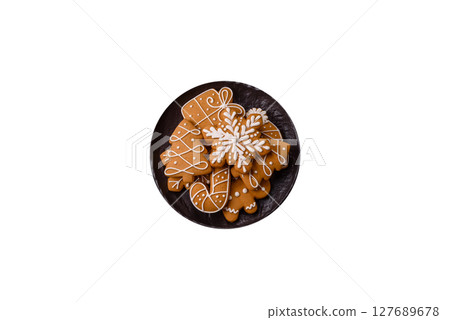 Christmas winter gingerbread, holiday biscuits on monochrome background 127689678