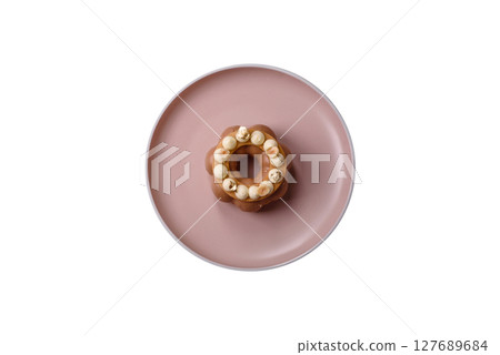 Round chocolate tart or pie with cream berry filling 127689684