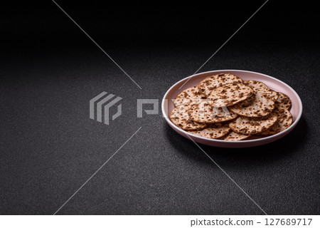 Matzah wheat bread for the Jewish holiday of passover. Kosher matzo bread Matzah wheat bread for the Jewish holiday of passover. Kosher matzo bread 127689717