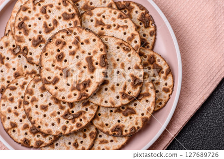 Matzah wheat bread for the Jewish holiday of passover. Kosher matzo bread 127689726