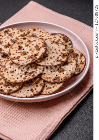 Matzah wheat bread for the Jewish holiday of passover. Kosher matzo bread 127689728