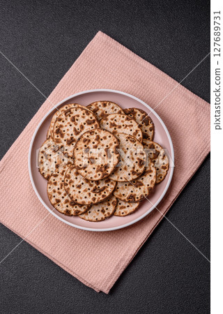 Matzah wheat bread for the Jewish holiday of passover. Kosher matzo bread Matzah wheat bread for the Jewish holiday of passover. Kosher matzo bread 127689731