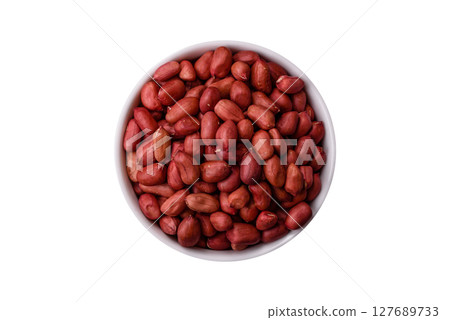Peanuts or peeled graundnut in a bowl on a white background 127689733