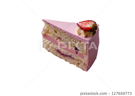 A slice of pink colored puff cake for a birthday celebration 127689773