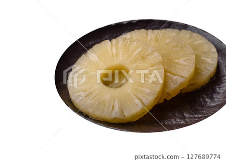Tropical fruit pineapple in rings or slices tinned sweet 127689774