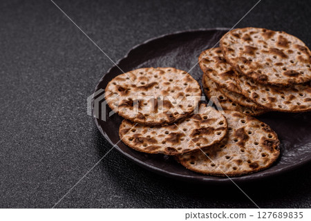 Matzah wheat bread for the Jewish holiday of passover. Kosher matzo bread 127689835