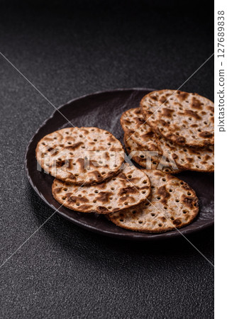 Matzah wheat bread for the Jewish holiday of passover. Kosher matzo bread 127689838