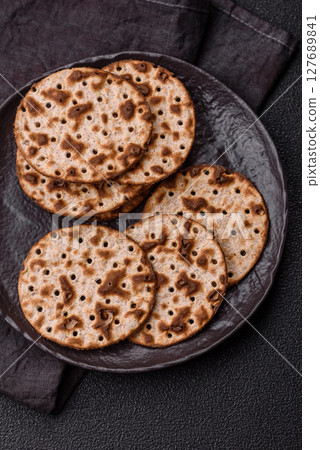 Matzah wheat bread for the Jewish holiday of passover. Kosher matzo bread 127689841