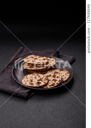 Matzah wheat bread for the Jewish holiday of passover. Kosher matzo bread 127689846