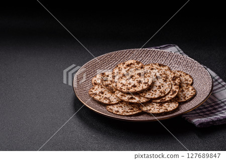 Matzah wheat bread for the Jewish holiday of passover. Kosher matzo bread Matzah wheat bread for the Jewish holiday of passover. Kosher matzo bread 127689847