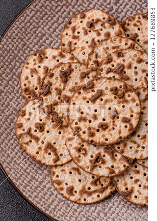 Matzah wheat bread for the Jewish holiday of passover. Kosher matzo bread 127689853
