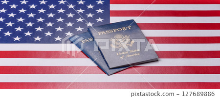American passport against the background of the US national flag 127689886