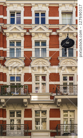 Colorful Historic Apartment Buildings With Ornate Facades and Wrought Iron Balconies 127690317
