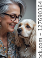 beautiful mature stylish blond lady with her creamy Spaniel dog. life style concept. Ai generated 127690364