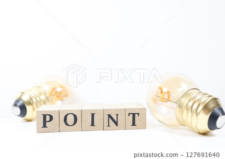 Conceptual image with a light bulb symbolizing a point or inspiration Conceptual image with a light bulb symbolizing a point or inspiration 127691640