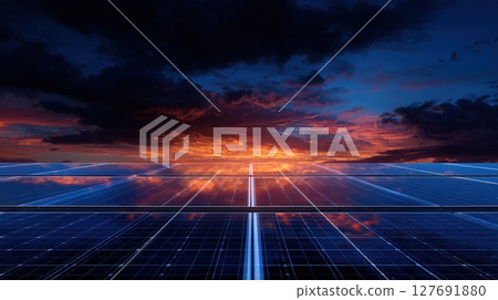 Solar panels generating clean energy under dramatic sunset sky Solar panels generating clean energy under dramatic sunset sky 127691880