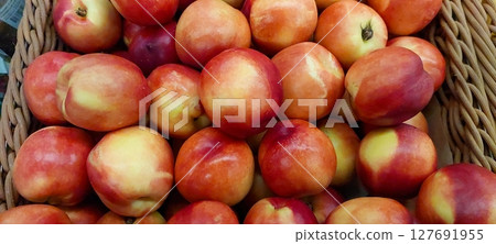 Fresh Nectarines Available for Sale at a Local Grocery Store in the Afternoon 127691955
