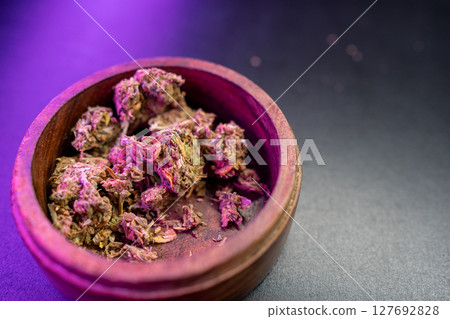 Bowl Filled With Vibrant Cannabis Buds Under 127692828