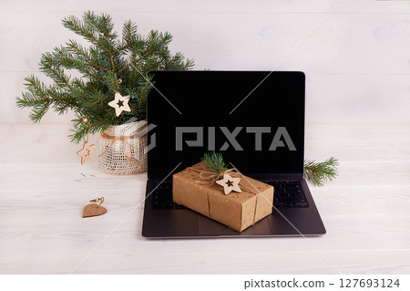 Shopping online for the Christmas holidays. Shopping online for the Christmas holidays. 127693124
