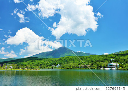 Nagano Prefecture, Mount Tateshina seen from Lake Shirakaba under blue skies 127693145