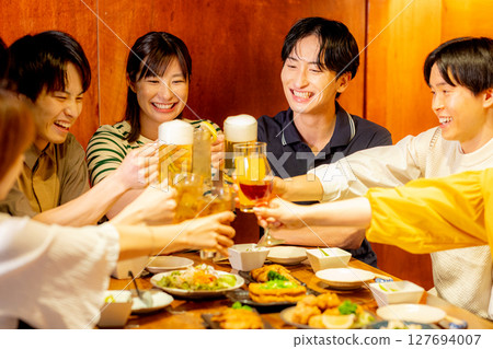 Drinking party at a university pub 127694007
