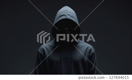 Hooded man in shadow "AI generated image" 127694015