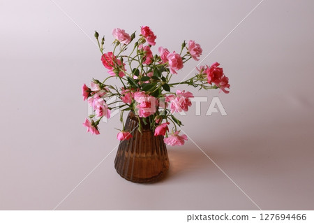 Mini roses in a vase Mini roses in a vase 127694466