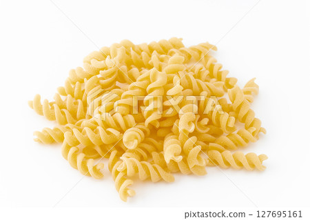 Fusilli (short pasta) on white background 127695161
