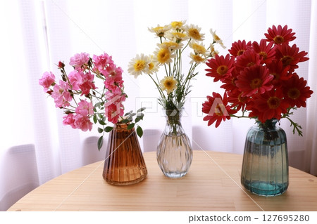 Three types of small flowers 127695280