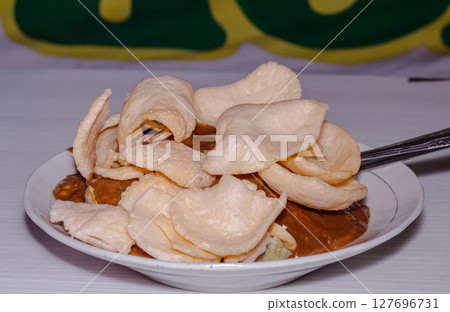 Delicious Gado-gado, a Popular Indonesian Street Food, Topped with White Crackers Delicious Gado-gado, a Popular Indonesian Street Food, Topped with White Crackers 127696731