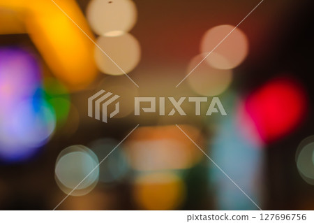 Abstract bokeh light circles creating a blurred atmospheric background Abstract bokeh light circles creating a blurred atmospheric background 127696756